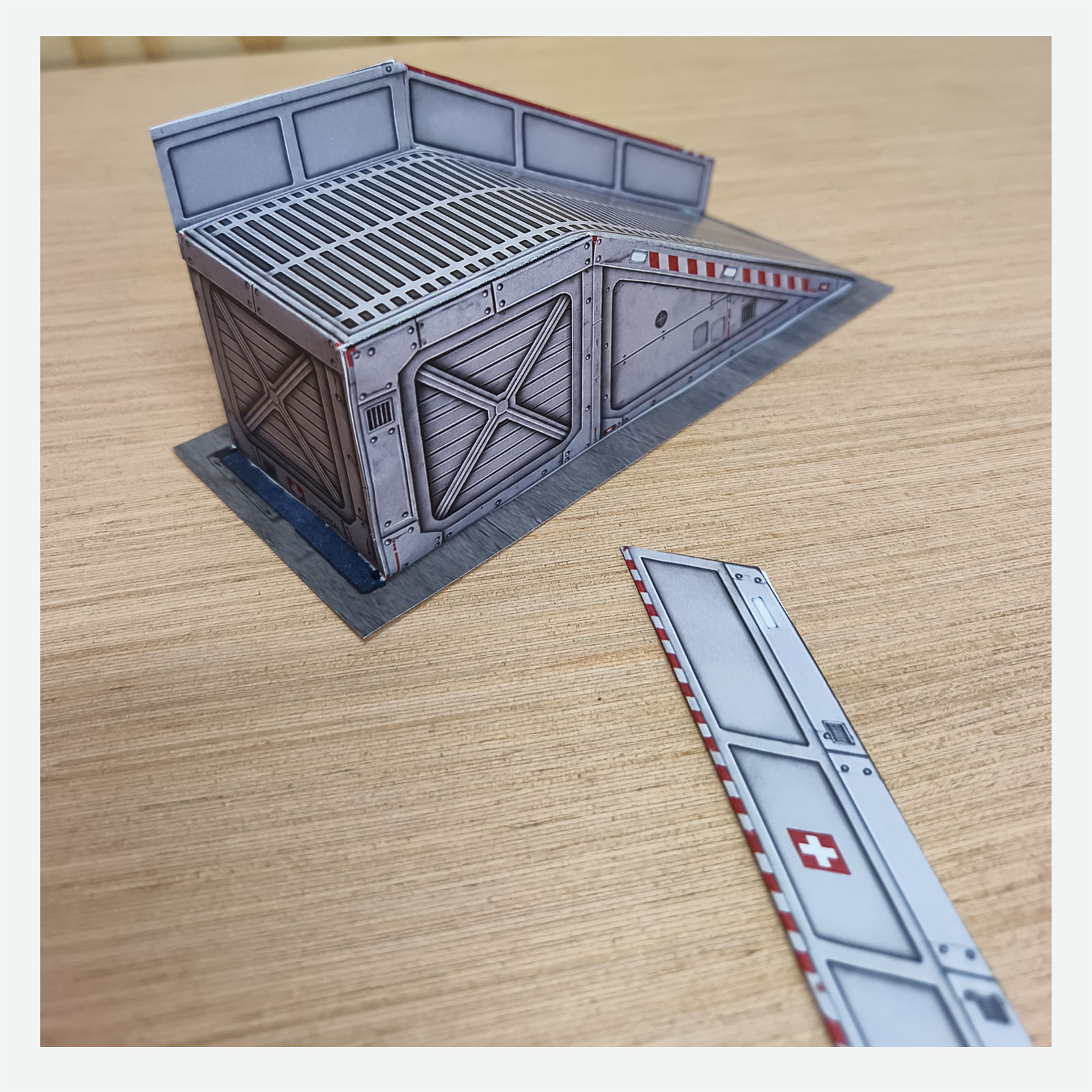 Close-up of the miniature hospital helipad access ramp during the final stage of assembly